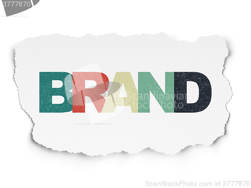 Image of Marketing concept: Brand on Torn Paper background