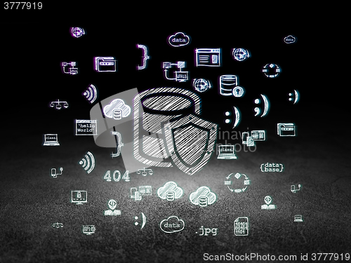 Image of Programming concept: Database With Shield in grunge dark room