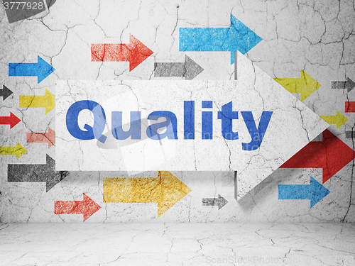 Image of Marketing concept: arrow with Quality on grunge wall background