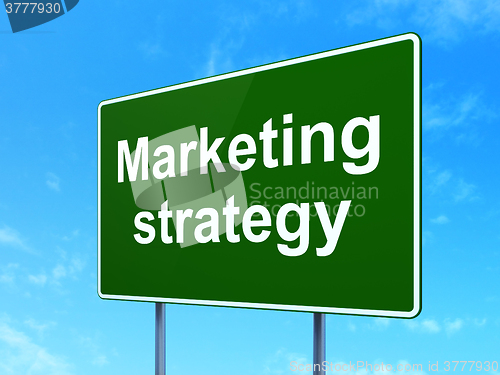 Image of Advertising concept: Marketing Strategy on road sign background