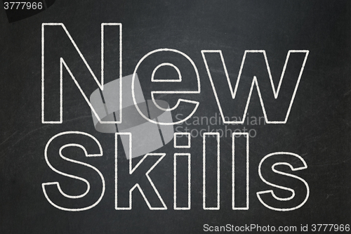 Image of Education concept: New Skills on chalkboard background