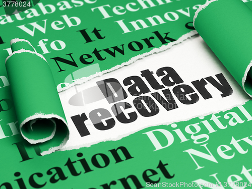 Image of Information concept: black text Data Recovery under the piece of  torn paper