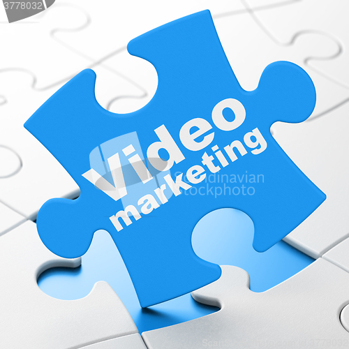 Image of Advertising concept: Video Marketing on puzzle background