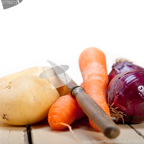 Image of basic vegetable ingredients carrot potato onion 