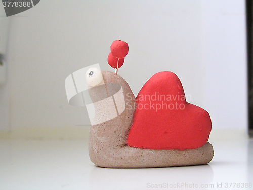 Image of Snail with shell in the form of heart