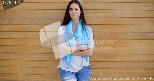 Image of Confident woman with folded arms