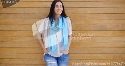 Image of Cheerful woman with folded arms