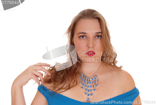 Image of Portrait of woman with necklace.