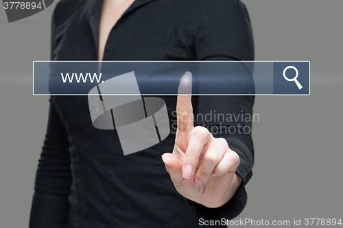 Image of Young woman touching web browser address bar with www sign