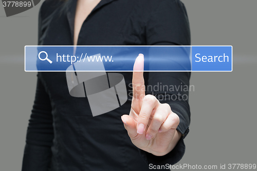 Image of Young woman touching web browser address bar with www sign