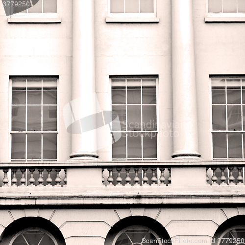 Image of old windon in england london brick and glass the wall 