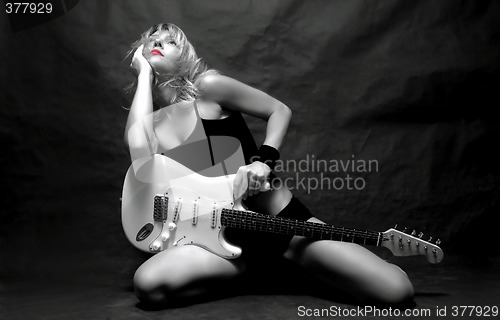 Image of girl and guitar