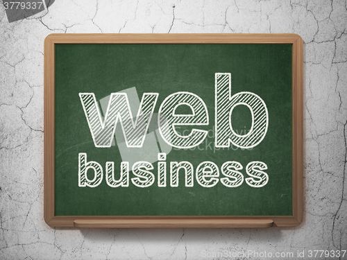 Image of Web development concept: Web Business on chalkboard background