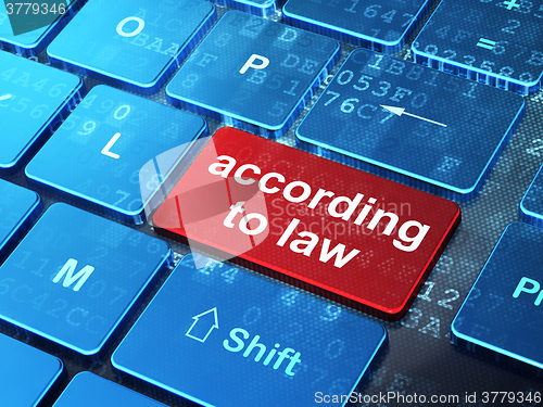 Image of Law concept: According To Law on computer keyboard background