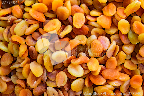 Image of Dried apricot fruit forming a background.