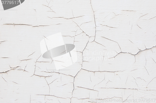 Image of White wall with cracks