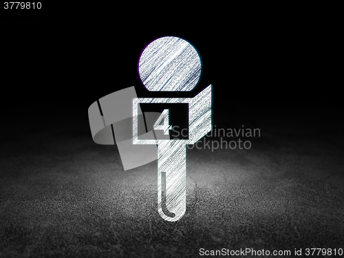 Image of News concept: Microphone in grunge dark room
