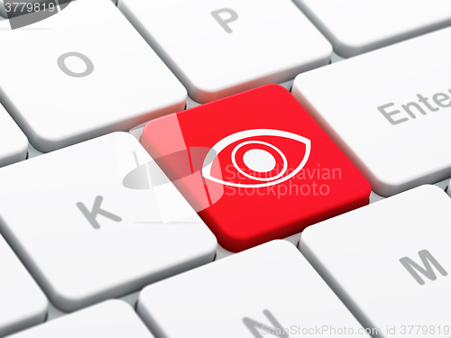 Image of Safety concept: Eye on computer keyboard background