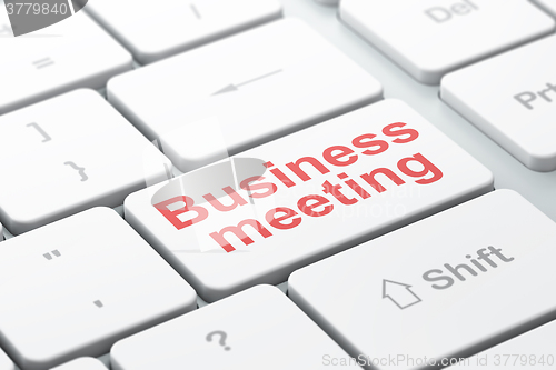 Image of Finance concept: Business Meeting on computer keyboard background