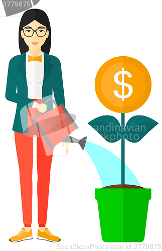 Image of Woman watering money flower.