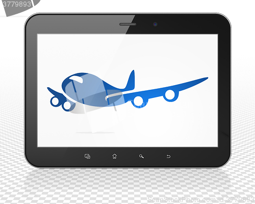 Image of Vacation concept: Tablet Pc Computer with Airplane on display