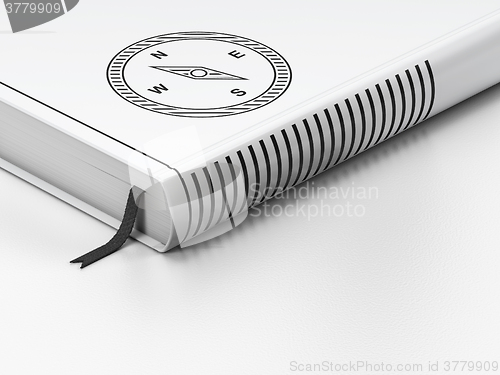 Image of Vacation concept: closed book, Compass on white background