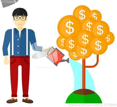 Image of Man watering money tree.