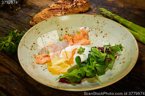 Image of Poached eggs with salmon and rasparagus