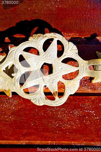 Image of metal rusty  brown    morocco in africa the old red gold star