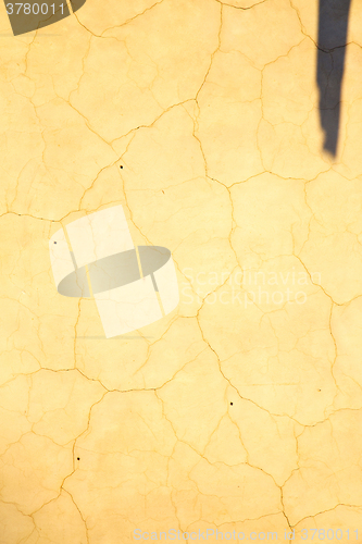 Image of pink in texture wall and  yellow shadow