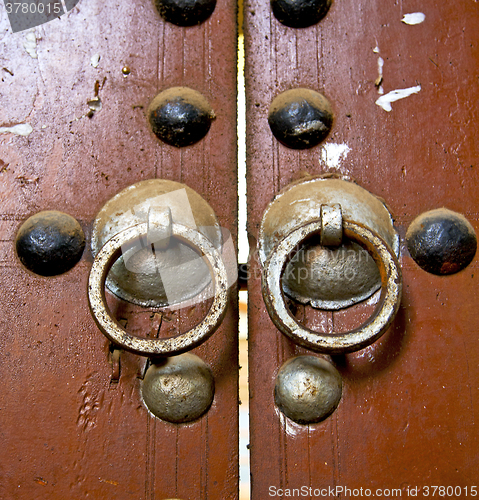 Image of rusty  brown    morocco in africa the old wood  facade home and 