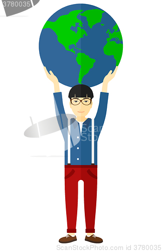 Image of Man holding globe.