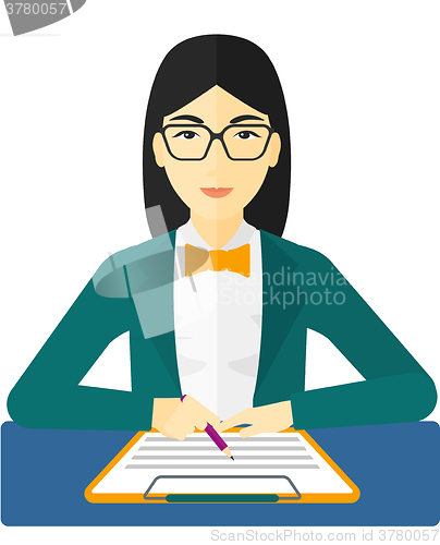 Image of Woman signing contract.