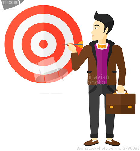 Image of Businessman with target board.