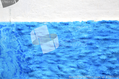 Image of blue  in texture wall  