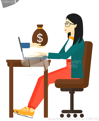 Image of Business woman working in office.