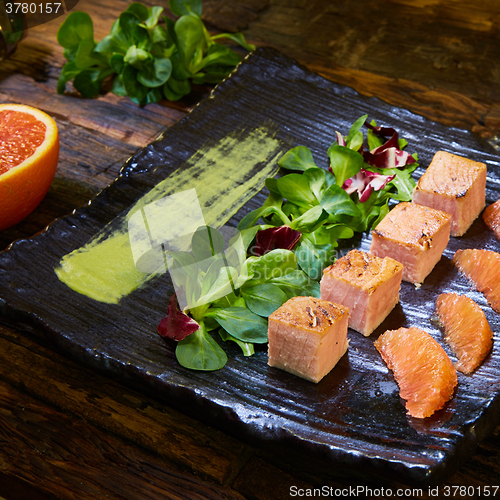 Image of Grill salmon salad, with mixed greens, avocado,grapefruit. Delicious healthy eating.