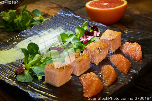 Image of Grill salmon salad, with mixed greens, avocado,grapefruit. Delicious healthy eating.