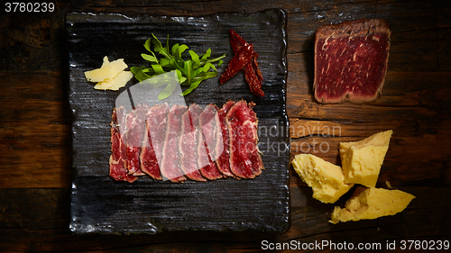 Image of Sliced meat boiled in low temperaturee, followed by roasting