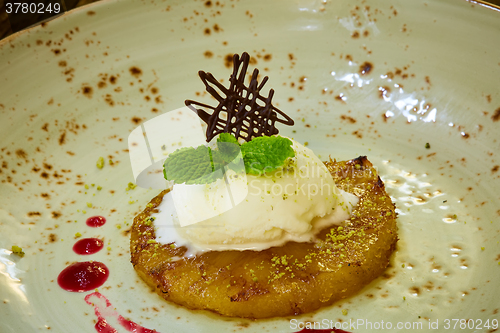 Image of Grilled pineapple with vanilla ice cream