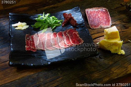 Image of Sliced meat boiled in low temperaturee, followed by roasting