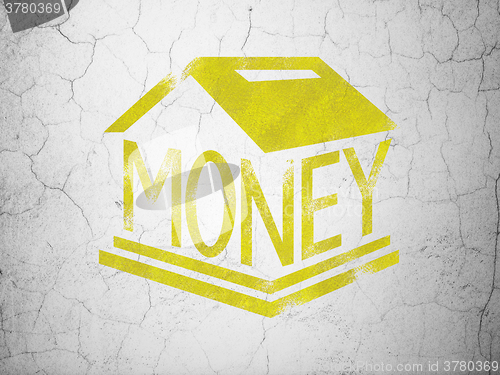 Image of Currency concept: Money Box on wall background