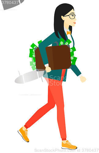 Image of Woman with suitcase full of money.