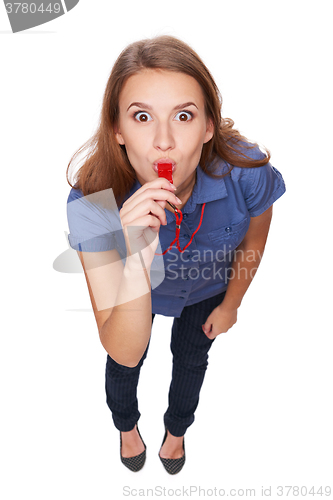 Image of Female blowing a whistle and pointing at you