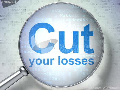 Image of Finance concept: Cut Your losses with optical glass