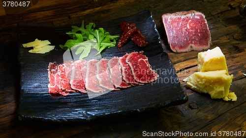 Image of Sliced meat boiled in low temperaturee, followed by roasting