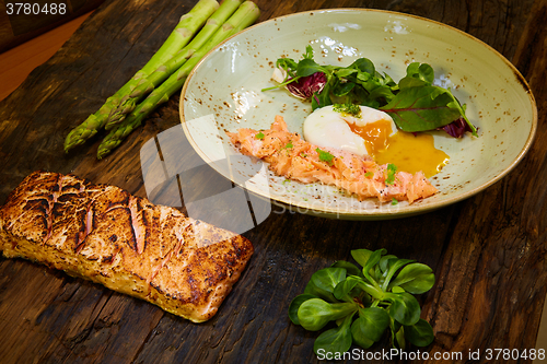 Image of Poached eggs with salmon and rasparagus