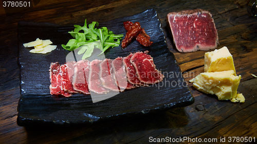 Image of Sliced meat boiled in low temperaturee, followed by roasting