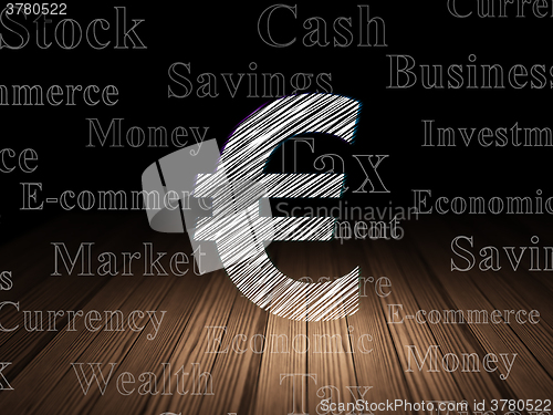 Image of Money concept: Euro in grunge dark room
