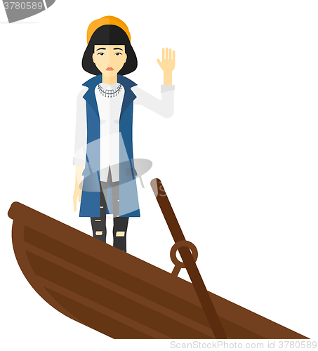 Image of Business woman standing in sinking boat.